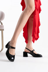 Sleek black glossy heels